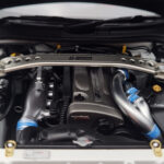 Nissan Skyline GT-R R34 Nismo Z-Tune Blanc MotorHelix 1:18 - image 9 of 11