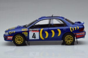 Subaru Impreza #4 C. McRae / D. Ringer Winner RAC Rally 1994 Kyosho 1:18 08962A Métal — image 4 sur 9