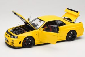 Nissan Skyline GT-R R34 Customized Version Jaune MotorHelix 1:18 M83412 Métal — image 2 sur 8